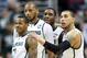 Mar 6, 2014; East Lansing, MI, USA; Michigan State Spartans guard Keith Appling (11) and forward Adreian Payne (5) and guard/forward Branden Dawson (22) and guard Denzel Valentine (45) stand on the court during the 2nd half of a game at Jack Breslin Student Events Center. MSU won 86-76. Mandatory Credit: Mike Carter-USA TODAY Sports