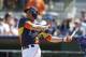 Houston Astros' George Springer bats during a spring training baseball game against the Toronto Blue Jays in Kissimmee, Fla., Sunday, March 9, 2014. (AP Photo/Carlos Osorio)