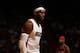 MIAMI, FL - March 10: LeBron James #6 of the Miami Heat looks on against the Washington Wizards at the American Airlines Arena in Miami, Florida on March 10 2014. NOTE TO USER: User expressly acknowledges and agrees that, by downloading and/or using this photograph, user is consenting to the terms and conditions of the Getty Images License Agreement. Mandatory copyright notice: Copyright NBAE 2014 (Photo by Issac Baldizon/NBAE via Getty Images)