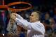 GAINESVILLE, FL - MARCH 08: Head coach Billy Donovan of the Florida Gators cuts off a piece of the net after the game against the Kentucky Wildcats at the Stephen C. O'Connell Center on March 8, 2014 in Gainesville, Florida. The Gators were 18-0 in the SEC Conference and undefeated at home this season. (Photo by Rob Foldy/Getty Images)