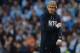 MANCHESTER, ENGLAND - MARCH 09: Manchester City manager Manuel Pellegrini looks dejected during the FA Cup Quarter-Final match between Manchester City and Wigan Athletic at the Etihad Stadium on March 9, 2014 in Manchester, England. (Photo by Michael Regan/Getty Images)