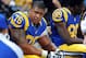 St. Louis Rams offensive tackle Rodger Saffold sits on the bench during the third quarter of an NFL football game against the Tampa Bay Buccaneers Sunday, Dec. 22, 2013, in St. Louis. (AP Photo/L.G. Patterson)