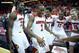 LOUISVILLE, KY - MARCH 08: Russ Smith #2 of the Louisville Cardinals celebrates with teammates after the game against the Connecticut Huskies at KFC YUM! Center on March 8, 2014 in Louisville, Kentucky. It was senior day and it was Smith's last home game. (Photo by Andy Lyons/Getty Images)