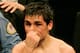 Argentina's light flyweight Juan Carlos Reveco reacts after losing his WBA light flyweight World Champion title against France's boxer Brahim Asloum, Saturday, Dec. 8, 2007, in Le Cannet, southern France. Asloum won the fight on unanimous decision. (AP Photo/Lionel Cironneau)