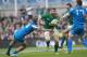 Ireland's Gordon D'Arcy, centre, is tackled by Italy's Michele Campagnaro, left, during their Six Nations Rugby Union international match at the Aviva Stadium, Dublin, Ireland, Saturday, March 8, 2014. (AP Photo/Peter Morrison)