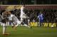 Tottenham's Emmanuel Adebayor, left, scores their second goal during the Europa League Group K soccer match between Tottenham Hotspur and Dnipro at White Hart Lane stadium in London, Thursday, Feb. 27, 2014. (AP Photo/Matt Dunham)
