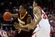 MADISON, WI - JANUARY 15: Devron Bostick #22 of the Minnesota Golden Gophers moves against Rob Wilson #33 of the Wisconsin Badgers on January 15, 2009 at the Kohl Center in Madison, Wisconsin. Minnesota defeated Wisconsin 78-74 in overtime. (Photo by Jonathan Daniel/Getty Images)