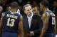 Pittsburgh head coach Jamie Dixon talks with Josh Newkirk (13) and Lamar Patterson (21) during a timeout in the second half of an NCAA college basketball game against Boston College in Boston, Wednesday, Feb. 26, 2014. (AP Photo/Michael Dwyer)