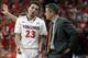 Virginia guard London Perrantes (23) talks with head coach Tony Bennett during the second half of an NCAA College basketball game in Charlottesville, Va., Saturday, March 1, 2014. Virginia won the game 75-56. (AP Photo/Steve Helber)