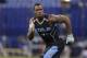 Alabama linebacker C.J. Mosley runs a drill at the NFL football scouting combine in Indianapolis, Monday, Feb. 24, 2014. (AP Photo/Michael Conroy)