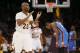 Los Angeles Lakers shooting guard Jodie Meeks, left, celebrates late in the fourth quarter as Oklahoma City Thunder small forward Kevin Durant, right, reaxts during an NBA basketball game in Los Angeles, Sunday, March 9, 2014. The Lakers won 114-110. (AP Photo/Danny Moloshok)