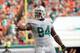 Miami Dolphins defensive tackle Randy Starks (94) gestures on the field during the first half of an NFL football game, Sunday, Nov. 24, 2013, in Miami Gardens, Fla. (AP Photo/J Pat Carter Carter STF AP)
