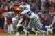 Dallas Cowboys linebacker DeMarcus Ware (94) sacks Denver Broncos quarterback Kyle Orton during the 4th quarter of an NFL football game in Denver on Sunday, Oct. 4, 2009. (AP Photo/David Zalubowski)