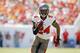 TAMPA, FL - SEPTEMBER 29: Darrelle Revis #24 of the Tampa Bay Buccaneers runs with the ball against the Arizona Cardinals at Raymond James Stadium on September 29, 2013 in Tampa, Florida. (Photo by Scott Iskowitz/Getty Images)
