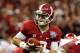 Jan 2, 2014; New Orleans, LA, USA; Alabama Crimson Tide quarterback AJ McCarron (10) looks to hand the ball off against the Oklahoma Sooners during the second half of the Sugar Bowl at the Mercedes-Benz Superdome. Oklahoma won, 45-31. Mandatory Credit: Chuck Cook-USA TODAY Sports