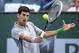 Novak Djokovic, of Serbia, returns a shot to Alejandro Gonzalez, of Colombia, in a third round match at the BNP Paribas Open tennis tournament, Tuesday, March 11, 2014, in Indian Wells, Calif. (AP Photo/Mark J. Terrill)