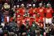 Ohio State players pose for photos after winning an NCAA college basketball game against Wisconsin 50-43 in the championship of the Big Ten tournament Sunday, March 17, 2013, in Chicago. (AP Photo/Charles Rex Arbogast)
