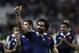 France's Yoann Huget gestures to celebrate his team's victory against England, during their Six Nations rugby union international match, at the Stade de France, in Saint Denis, outside Paris, Saturday, Feb 1, 2014. France defeated England 26-24. (AP Photo/Thibault Camus)