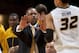 Missouri head coach Frank Haith, left, slows down player Jabari Brown, right, as he brings the ball up court during the second half of an NCAA college basketball game against Vanderbilt, Wednesday, Feb. 19, 2014, in Columbia, Mo. Missouri won the game 67-64. (AP Photo/L.G. Patterson)