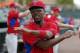 Philadelphia Phillies' Jimmy Rollins warms up before before an exhibition spring training baseball game against the Baltimore Orioles in Sarasota, Fla., Friday, March 7, 2014. (AP Photo/Gene J. Puskar)