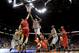 KANSAS CITY, MO - MARCH 12: Marcus Smart #33 of the Oklahoma State Cowboys battles Dejan Kravic #11 of the Texas Tech Red Raiders for a rebound during the Big 12 Basketball Tournament first round game at the Sprint Center on March 12, 2014 in Kansas City, Missouri. (Photo by Jamie Squire/Getty Images)