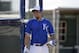 Kansas City Royals' Omar Infante walks out of the cage after hitting during spring baseball practice, Friday, March 7, 2014, in Surprise, Ariz. (AP Photo/Tony Gutierrez)