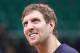 Dallas Mavericks' Dirk Nowitzki smiles during practice before the start of their NBA basketball game against the Utah Jazz Wednesday, March 12, 2014, in Salt Lake City. (AP Photo/Rick Bowmer)