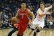 Houston Rockets guard Jeremy Lin (7) drives past Phoenix Suns guard Goran Dragic (1) in the second quarter of an NBA basketball game, Sunday, Feb. 23, 2014, in Phoenix. (AP Photo/Rick Scuteri)