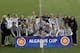 Germany's team pose for the media with their trophy after winning the women's soccer Algarve Cup at the Algarve stadium, outside Faro, southern Portugal, Wednesday, March 12, 2014. (AP Photo/Francisco Seco)