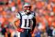 January 19, 2014; Denver, CO, USA; New England Patriots wide receiver Julian Edelman (11) against the Denver Broncos in the 2013 AFC Championship football game at Sports Authority Field at Mile High. Mandatory Credit: Mark J. Rebilas-USA TODAY Sports