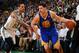 BOSTON, MA - MARCH 5: Klay Thompson #11 of the Golden State Warriors drives against Chris Babb #52 of the Boston Celtics on March 5, 2014 at the TD Garden in Boston, Massachusetts. NOTE TO USER: User expressly acknowledges and agrees that, by downloading and or using this photograph, User is consenting to the terms and conditions of the Getty Images License Agreement. Mandatory Copyright Notice: Copyright 2014 NBAE (Photo by Brian Babineau/NBAE via Getty Images)