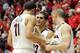 Feb 26, 2014; Tucson, AZ, USA; Arizona Wildcats guard Nick Johnson (13) talks to forward Aaron Gordon (11) on the bench during the second half against the California Golden Bears at McKale Center. Arizona won 87-59. Mandatory Credit: Casey Sapio-USA TODAY Sports