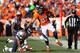 DENVER, CO - JANUARY 19: Eric Decker #87 of the Denver Broncos tries to avod the tackle of Logan Ryan #26 of the New England Patriots in the third quarter during the AFC Championship game at Sports Authority Field at Mile High on January 19, 2014 in Denver, Colorado. (Photo by Jamie Squire/Getty Images)