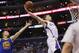 Los Angeles Clippers' Blake Griffin dunks the ball on a rebound in front of Golden State Warriors Stephen Curry, left, during the second half of an NBA basketball game in Los Angeles, Wednesday, March 12, 2014. The Clippers won 111-98. (AP Photo/Danny Moloshok)
