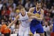 Los Angeles Clippers' Blake Griffin, left, fights for position with Golden State Warriors' Andrew Bogut during the first half of an NBA basketball game in Los Angeles, Wednesday, March 12, 2014. (AP Photo/Danny Moloshok)