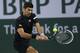 INDIAN WELLS, CA - MARCH 12: Novak Djokovic of Serbia hits a return to Marin Cilic of Croatia during the BNP Paribas Open at Indian Wells Tennis Garden on March 12, 2014 in Indian Wells, California. (Photo by Stephen Dunn/Getty Images)