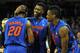 COLUMBIA, SC - MARCH 04: Casey Prather #24 and Will Yeguete #15 congratulate Michael Frazier II #20 of the Florida Gators near the end of their game against the South Carolina Gamecocks at Colonial Life Arena on March 4, 2014 in Columbia, South Carolina. Florida defeated South Carolina 72-46. (Photo by Lance King/Getty Images)