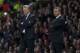 Manchester United's manager David Moyes, left, stands alongside Liverpool's manager Brendan Rodgers during their English League Cup soccer match at Old Trafford Stadium, Manchester, England, Wednesday Sept. 25, 2013. (AP Photo/Jon Super)