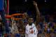 GAINESVILLE, FL - MARCH 08: Casey Prather #24 of the Florida Gators holds up a piece of the net after the game against the Kentucky Wildcats at the Stephen C. O'Connell Center on March 8, 2014 in Gainesville, Florida. The Gators were 18-0 in the SEC Conference and undefeated at home this season. (Photo by Rob Foldy/Getty Images)