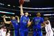 ARLINGTON, TX - MARCH 29: Chase Fieler #20 pulls down a rebound inbetween Christophe Varidel #5 and Eric McKnight #12 of the Florida Gulf Coast Eagles against the Florida Gators during the South Regional Semifinal round of the 2013 NCAA Men's Basketball Tournament at Dallas Cowboys Stadium on March 29, 2013 in Arlington, Texas. (Photo by Tom Pennington/Getty Images)