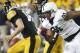 IOWA CITY, IOWA - OCTOBER 20: Defensive tackle DaQuan Jones #91of the Penn State Nittany Lions eyes a loose ball during the second quarter fumbled by quarterback James Vandenberg #16 of the Iowa Hawkeyes on October 20, 2012 at Kinnick Stadium in Iowa City, Iowa. Penn State defeated Iowa 38-14. (Photo by Matthew Holst/Getty Images)
