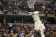 Indiana forward Noah Vonleh (1) blocks a shot by Illinois guard Tracy Abrams (13) in the first half of an NCAA college basketball game in the first round of the Big Ten Conference tournament Thursday, March 13, 2014, in Indianapolis. (AP Photo/Kiichiro Sato)