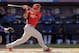St. Louis Cardinals' Kolten Wong hits an RBI-single during the sixth inning of an exhibition spring training baseball game against the New York Mets Friday, March 7, 2014, in Port St. Lucie, Fla. (AP Photo/Jeff Roberson)