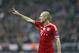 Bayern's Arjen Robben gestures during the Champions League round of 16 second leg soccer match between FC Bayern Munich and FC Arsenal in Munich, Germany, Wednesday, March 12, 2014. (AP Photo/Matthias Schrader)