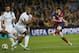 Barcelona's Lionel Messi, right shoots on goal during a Champions League, round of 16, second leg, soccer match between FC Barcelona and Manchester City at the Camp Nou Stadium in Barcelona, Spain, Wednesday March 12, 2014. (AP Photo/Emilio Morenatti)