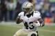 FILE - In this Jan. 11, 2014, file photo, New Orleans Saints running back Darren Sproles runs against the Seattle Seahawks during an NFC divisional playoff NFL football game in Seattle. The Philadelphia Eagles were eager to let the world know about the addition of the 30-year-old Sproles, who figures to be a threat as a receiver, runner, returner and in pass protection against blitzers. (AP Photo/Elaine Thompson, File)
