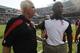 Chicago Bears head coach Lovie Smith, right, shakes hands with Atlanta Falcons head coach Mike Smith after their NFL football game in Chicago, Sunday, Sept. 11, 2011. The Bears won 30-12. (AP Photo/Nam Y. Huh)