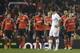 Benfica's players celebrate the goal of Luisao, second right, during the Europa League round of 16 first leg soccer match between Tottenham Hotspur and SL Benfica at White Hart Lane stadium in London Thursday, March 13, 2014. (AP Photo/Kirsty Wigglesworth)