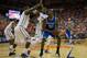 GAINESVILLE, FL - MARCH 08: Julius Randle #30 of the Kentucky Wildcats is defended by Will Yeguete #15 and Patric Young #4 of the Florida Gators during the second half of the game at the Stephen C. O'Connell Center on March 8, 2014 in Gainesville, Florida. (Photo by Rob Foldy/Getty Images)