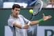 Novak Djokovic, of Serbia, returns a shot to Alejandro Gonzalez, of Colombia, in a third round match at the BNP Paribas Open tennis tournament, Tuesday, March 11, 2014, in Indian Wells, Calif. (AP Photo/Mark J. Terrill)